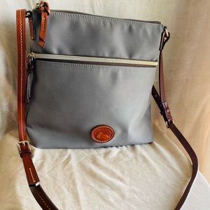 Dooney and Bourke nylon crossbody bags, each sold separately